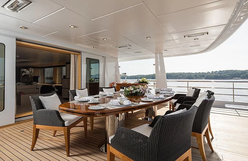 a dining room with a table and chairs aboard GRACE (YET) Yacht for Sale