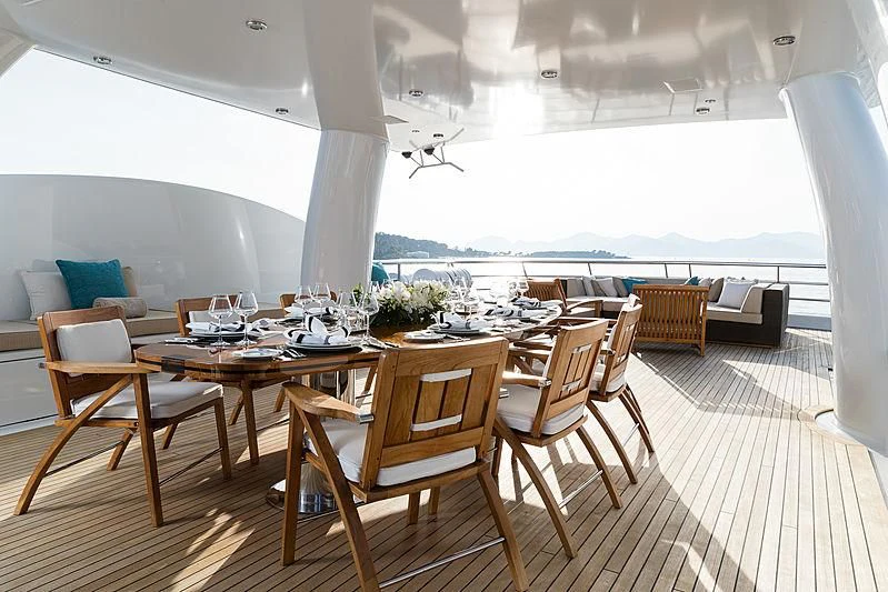 a room with a table and chairs aboard GRACE (YET) Yacht for Sale