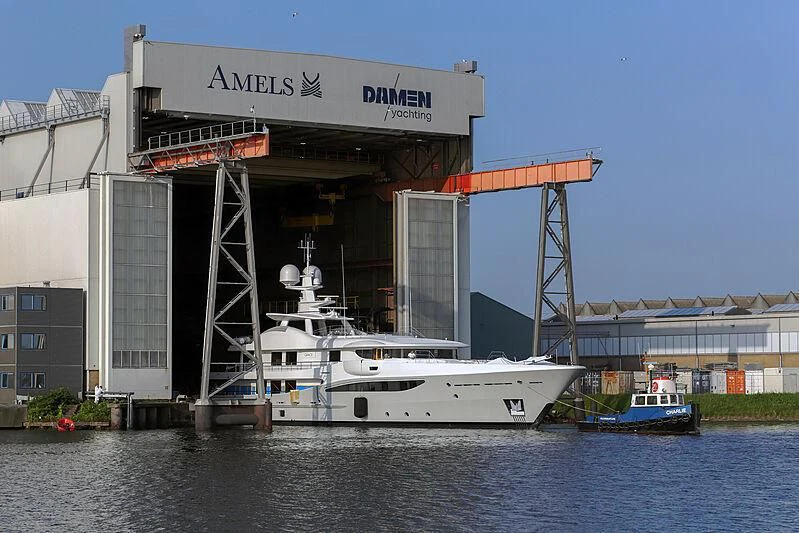 a large white boat in a body of water aboard GRACE (YET) Yacht for Sale