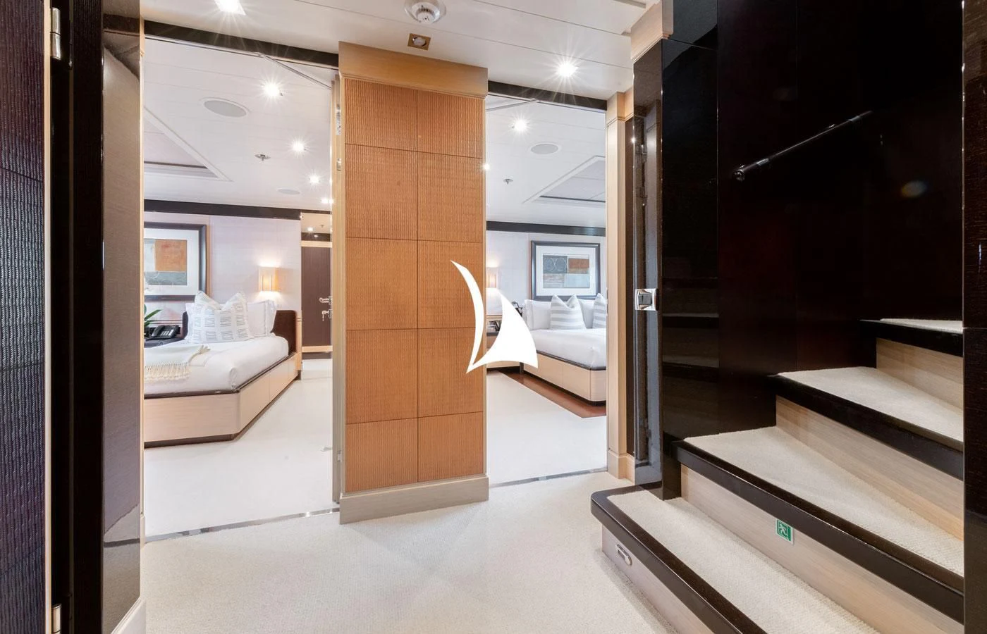a room with a bed and a mirror aboard GRACE (YET) Yacht for Sale