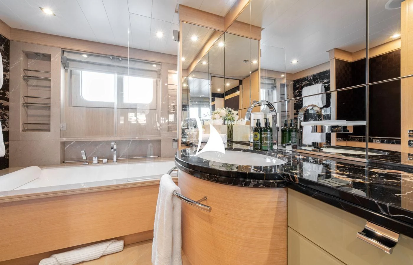 a bathroom with a sink and a bathtub aboard GRACE (YET) Yacht for Sale