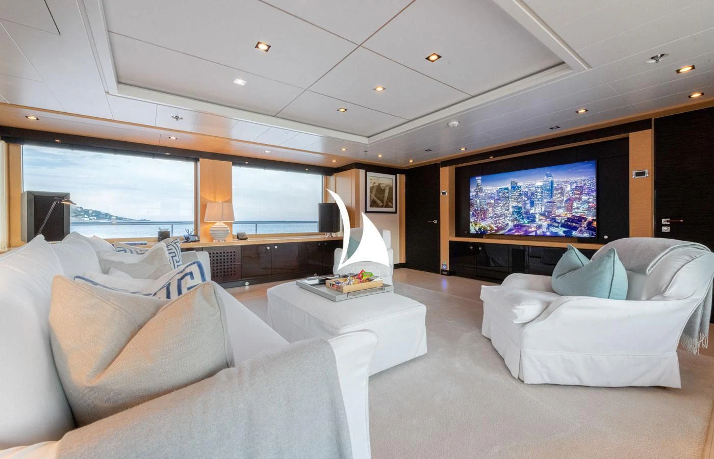 a living room with a large television aboard GRACE (YET) Yacht for Sale
