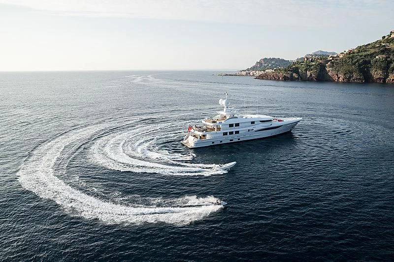 a boat on the water aboard GRACE (YET) Yacht for Sale