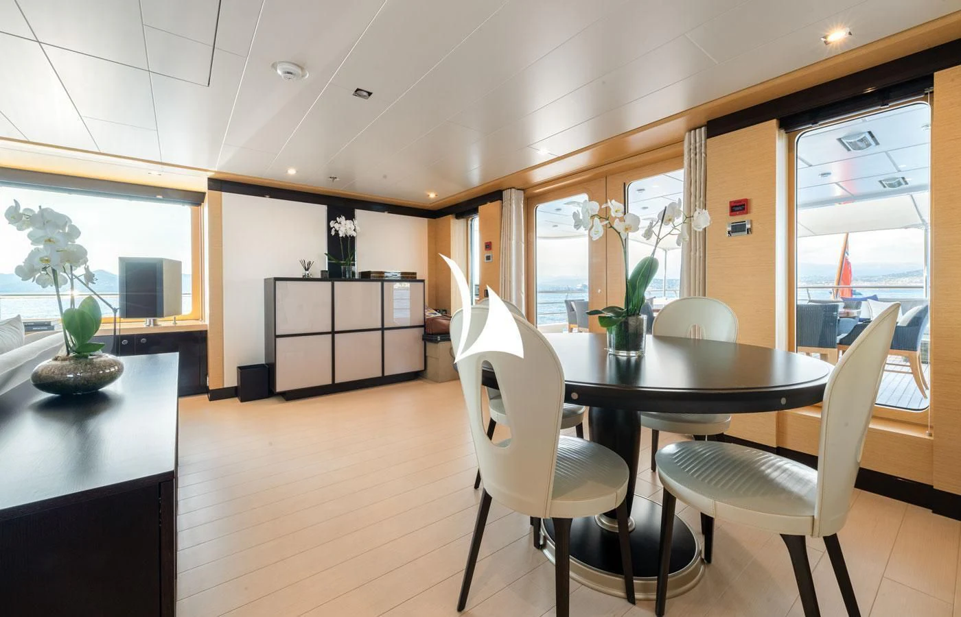 a room with a table and chairs aboard GRACE (YET) Yacht for Sale