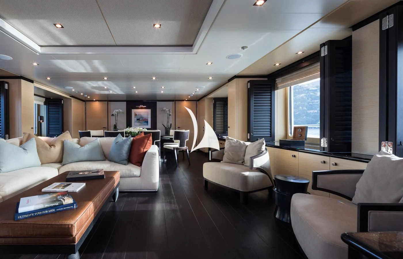 a living room with a large screen aboard GRACE (YET) Yacht for Sale