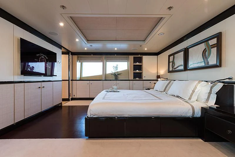 a bedroom with a large bed aboard GRACE (YET) Yacht for Sale