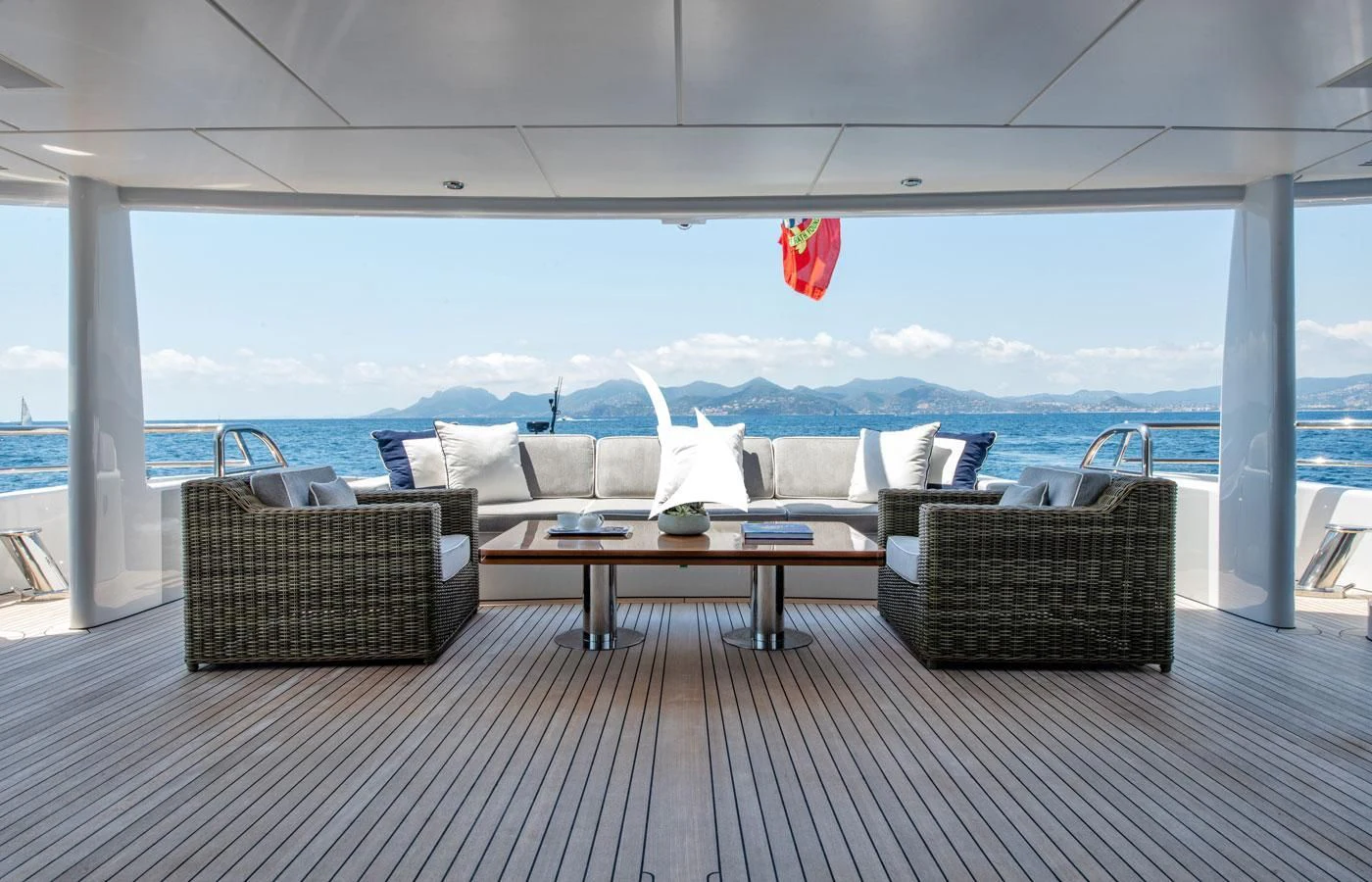 a patio with chairs and tables aboard GRACE (YET) Yacht for Sale