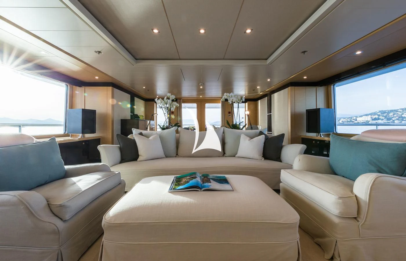 a living room with a large sofa aboard GRACE (YET) Yacht for Sale