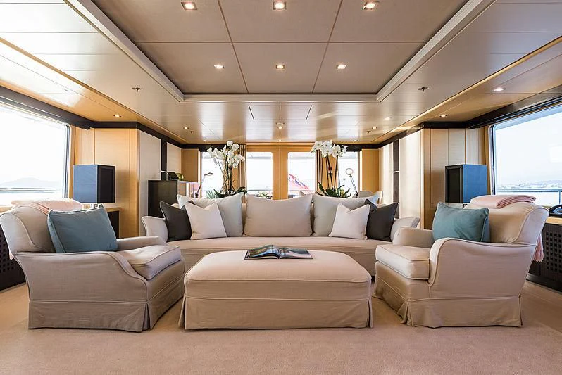 a living room with a couch and a tv aboard GRACE (YET) Yacht for Sale