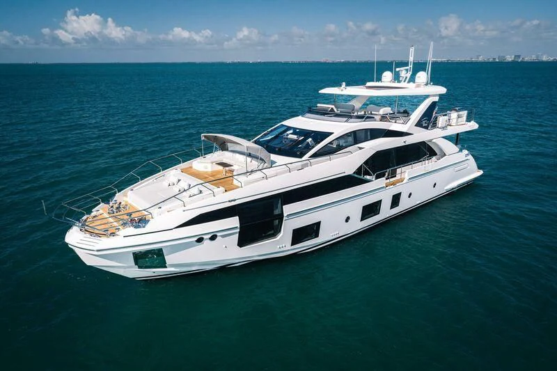 a white yacht in the ocean aboard ECLIPSE Yacht for Sale