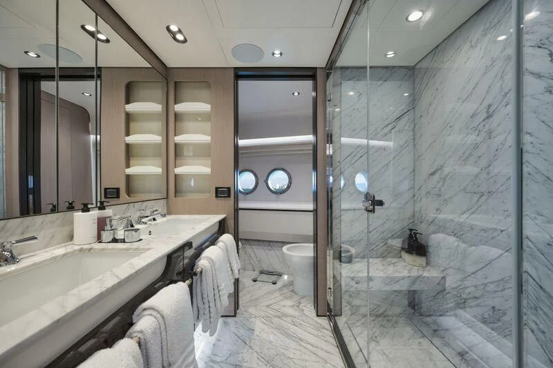 a bathroom with a glass shower aboard ECLIPSE Yacht for Sale
