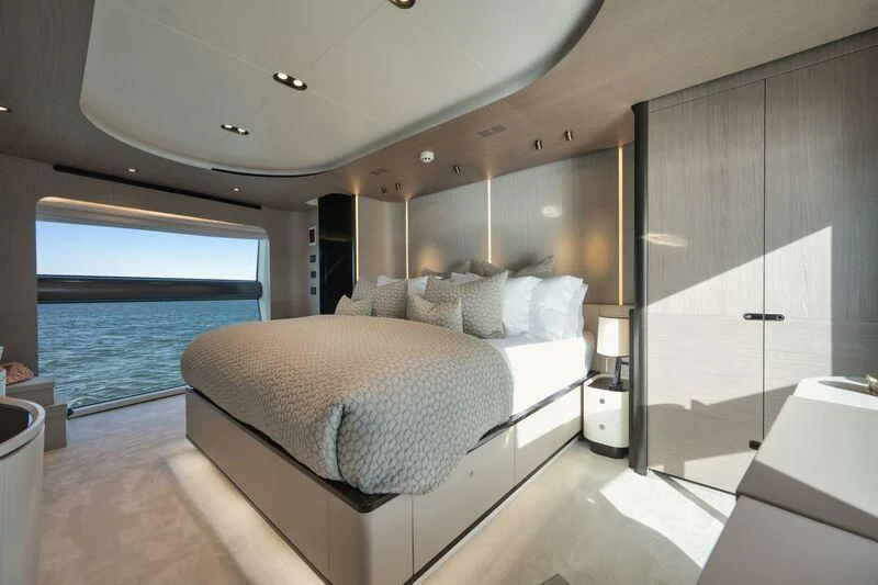 a large bedroom with a large bed aboard ECLIPSE Yacht for Sale