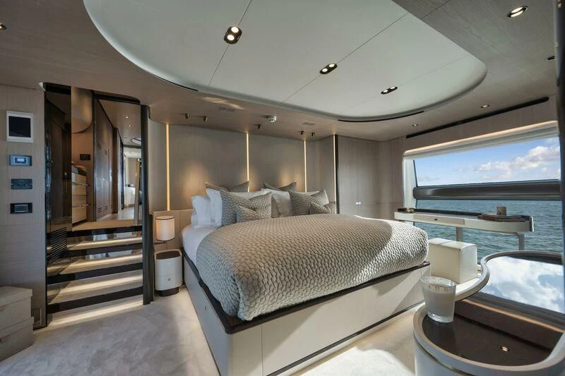 a bed in a room aboard ECLIPSE Yacht for Sale