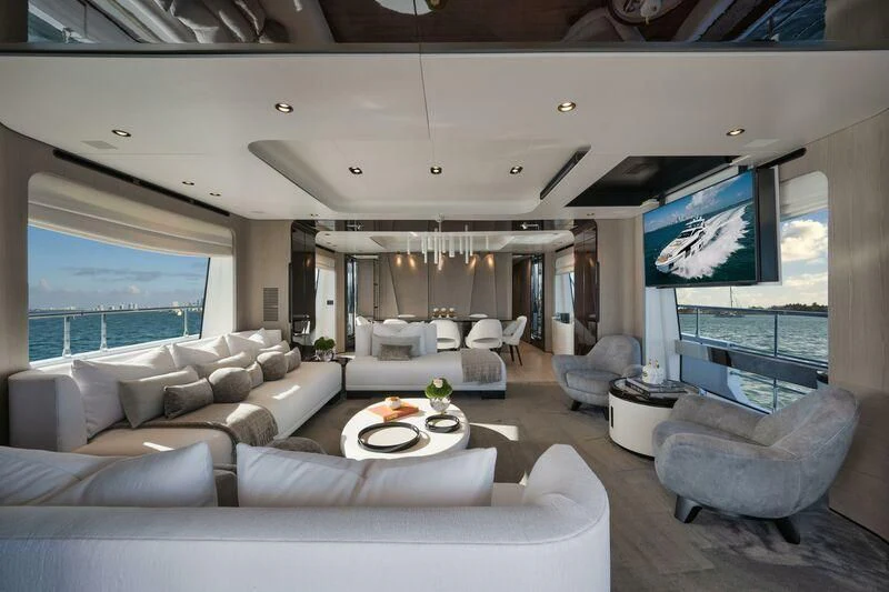 a living room with a large screen aboard ECLIPSE Yacht for Sale