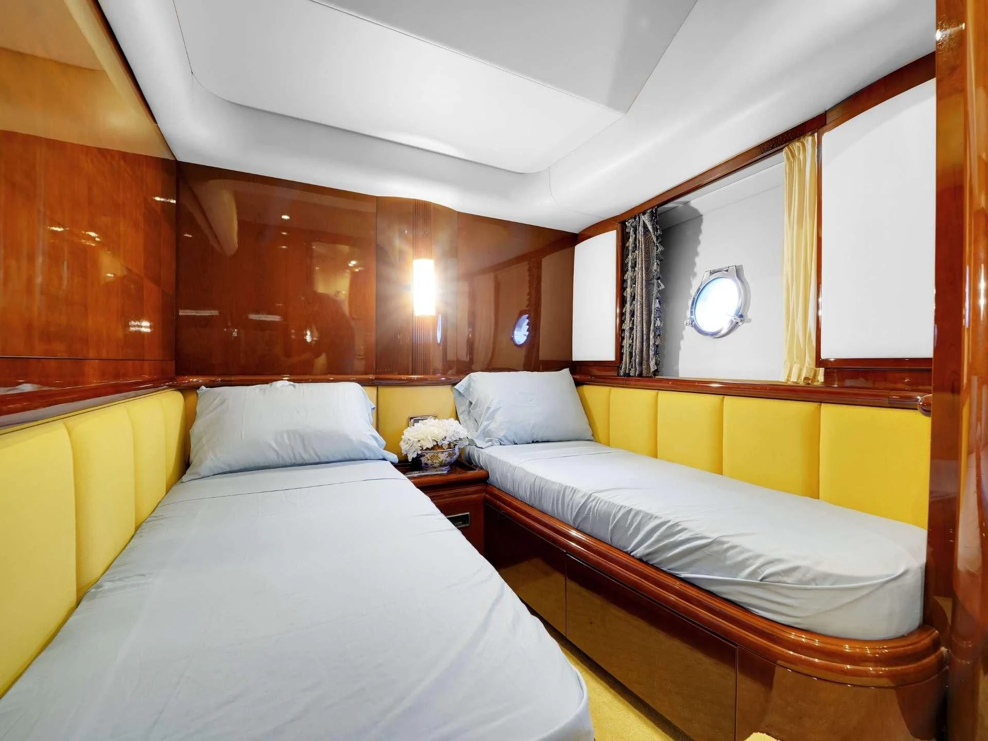 a room with two beds aboard DELMAR Yacht for Sale