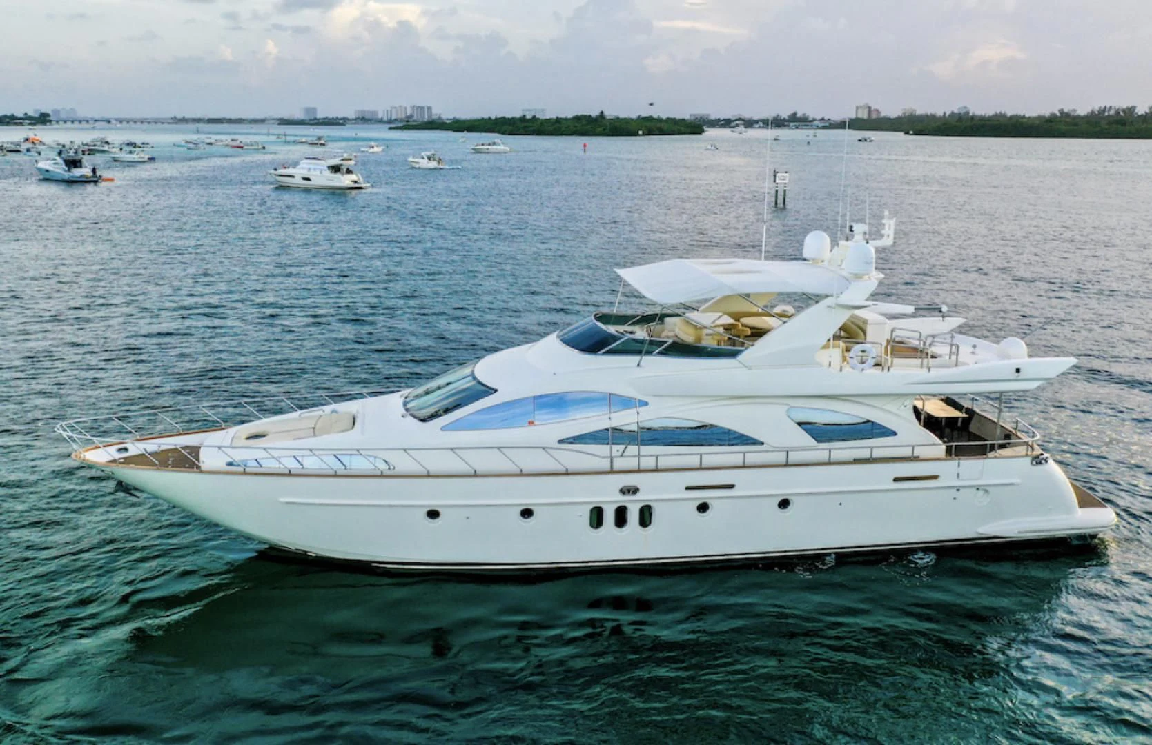 a white yacht in the water aboard DELMAR Yacht for Sale