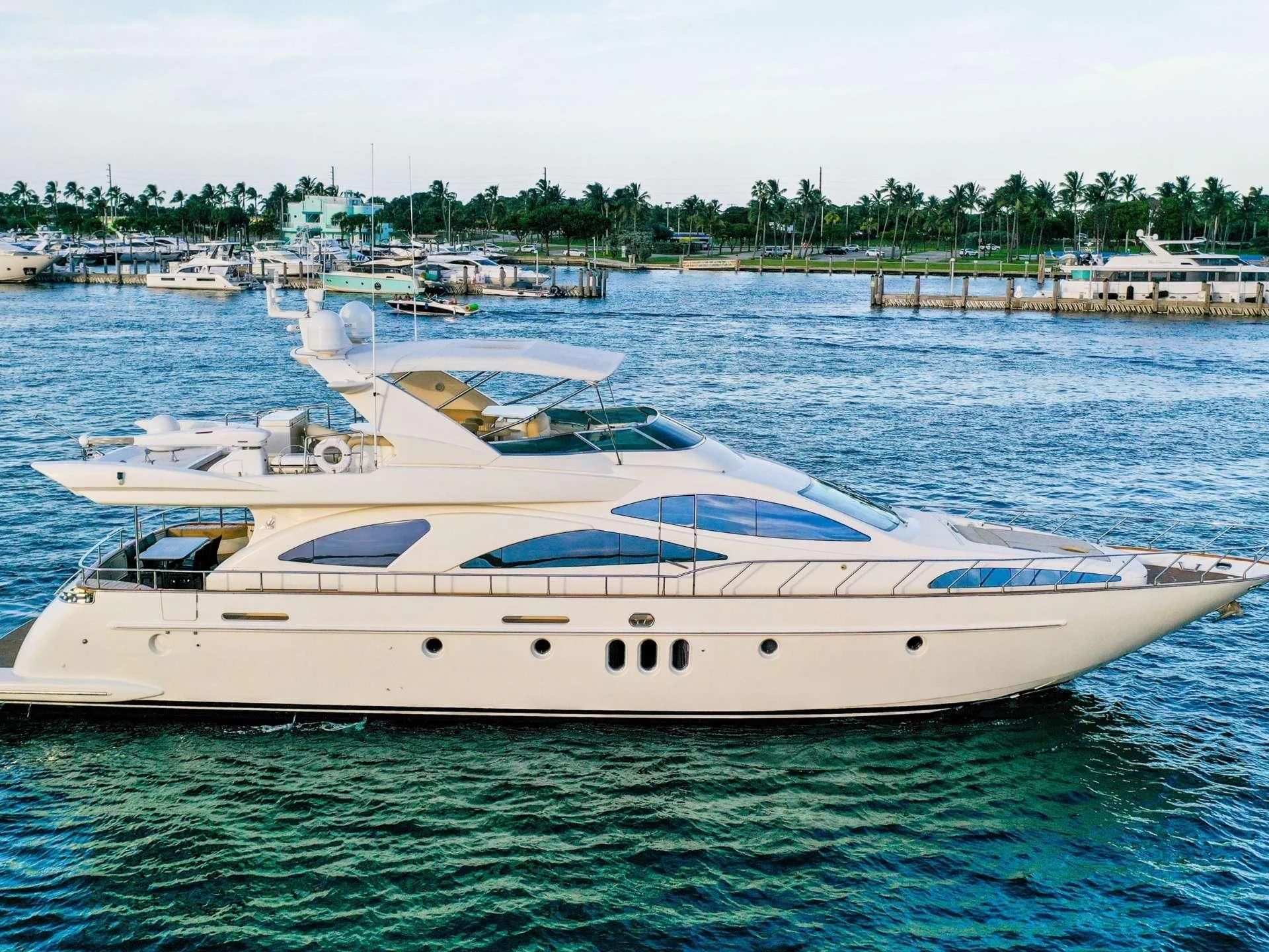 a white yacht in the water aboard DELMAR Yacht for Sale