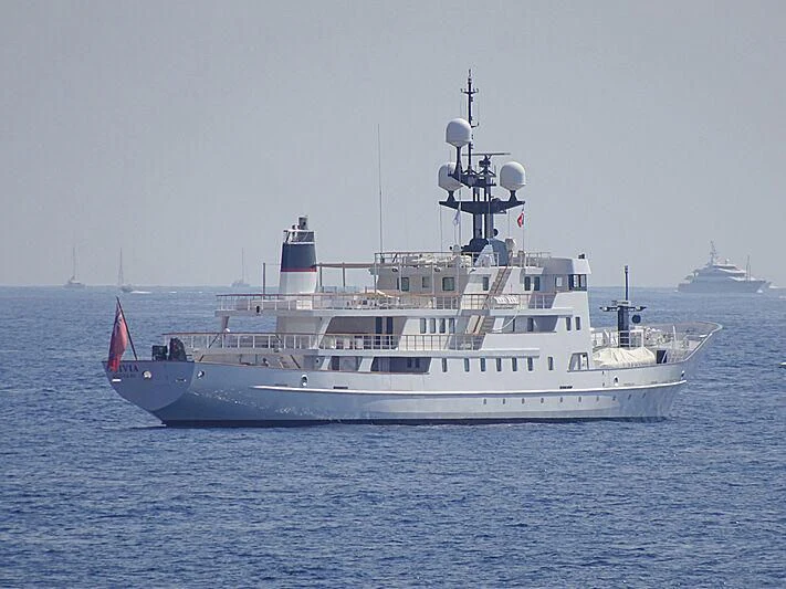 a large white boat in the water aboard JESTER Yacht for Sale