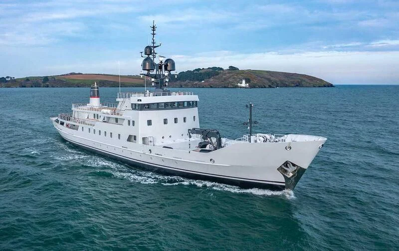 a large white boat in the water aboard JESTER Yacht for Sale