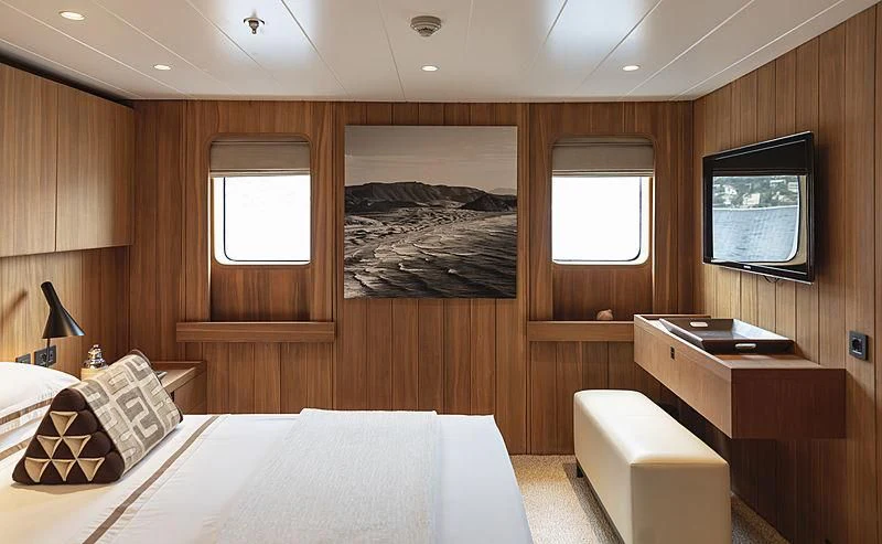 a room with a bed and a tv aboard JESTER Yacht for Sale