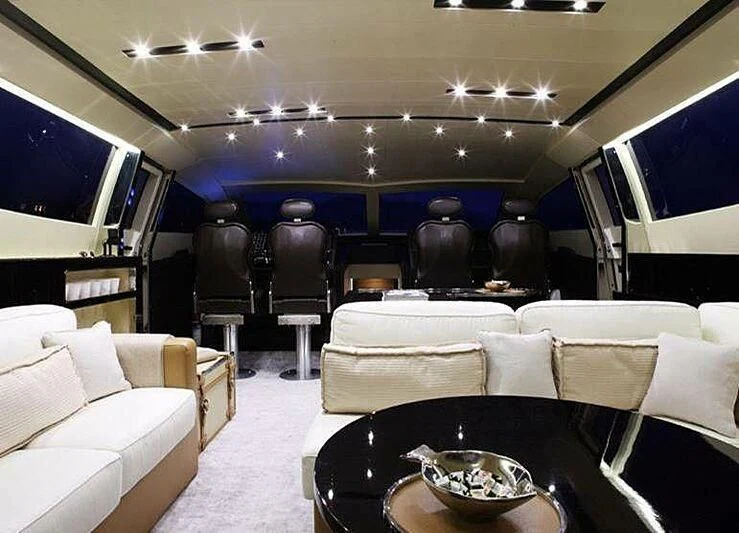 a room with a table and chairs aboard TACHION Yacht for Sale