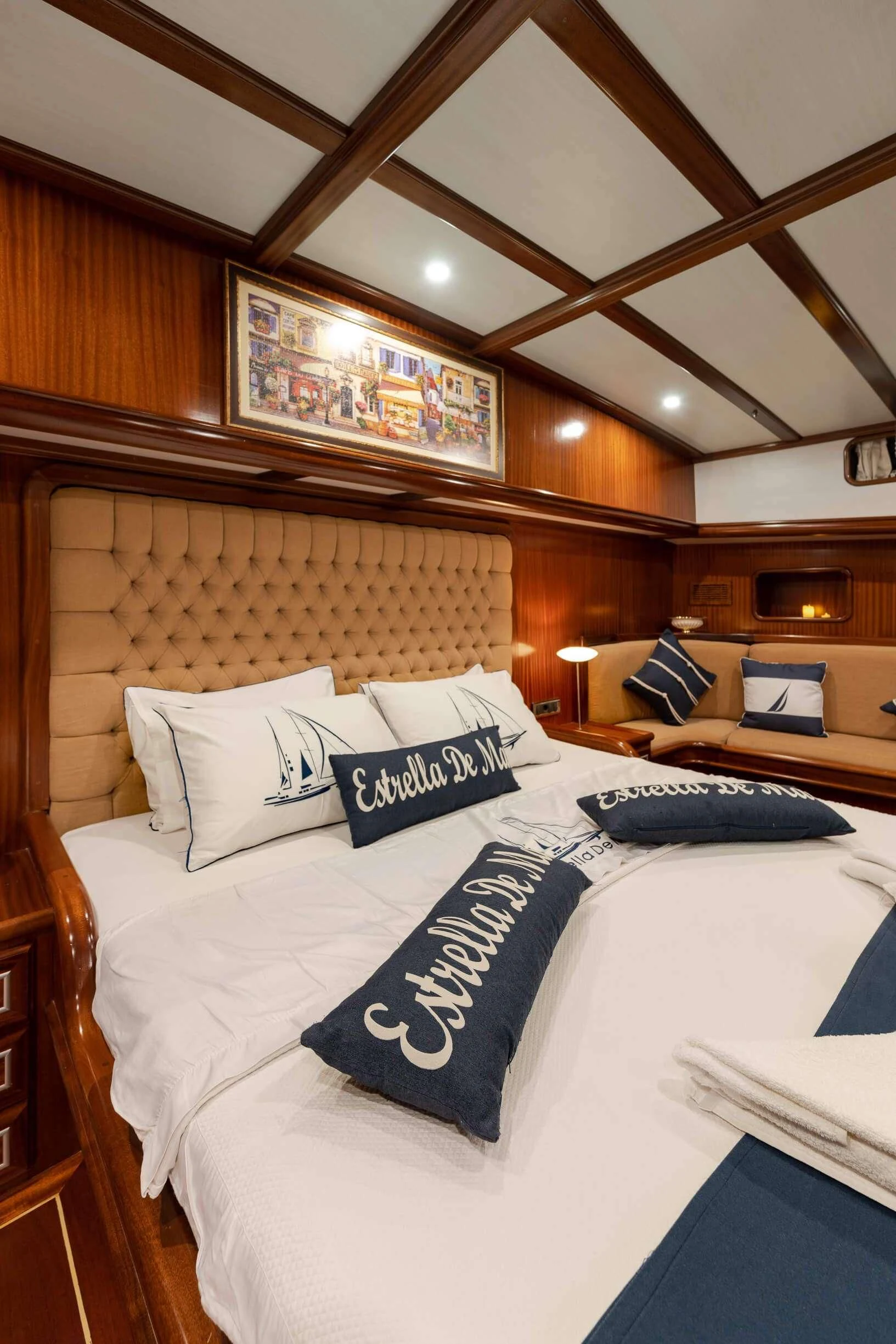 a bed with white sheets and pillows aboard ESTRELLA DE MAR Yacht for Sale