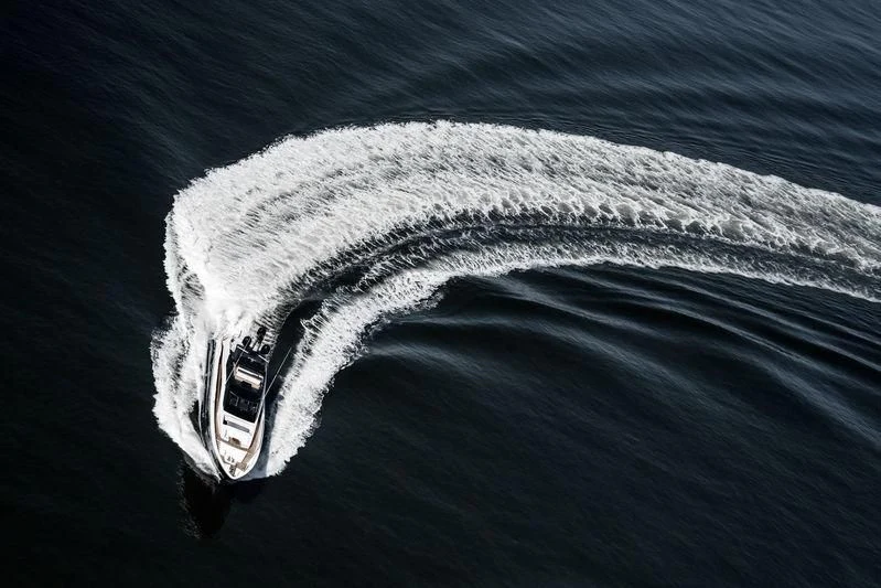 a white glove on a black surface aboard IRISHA Yacht for Sale