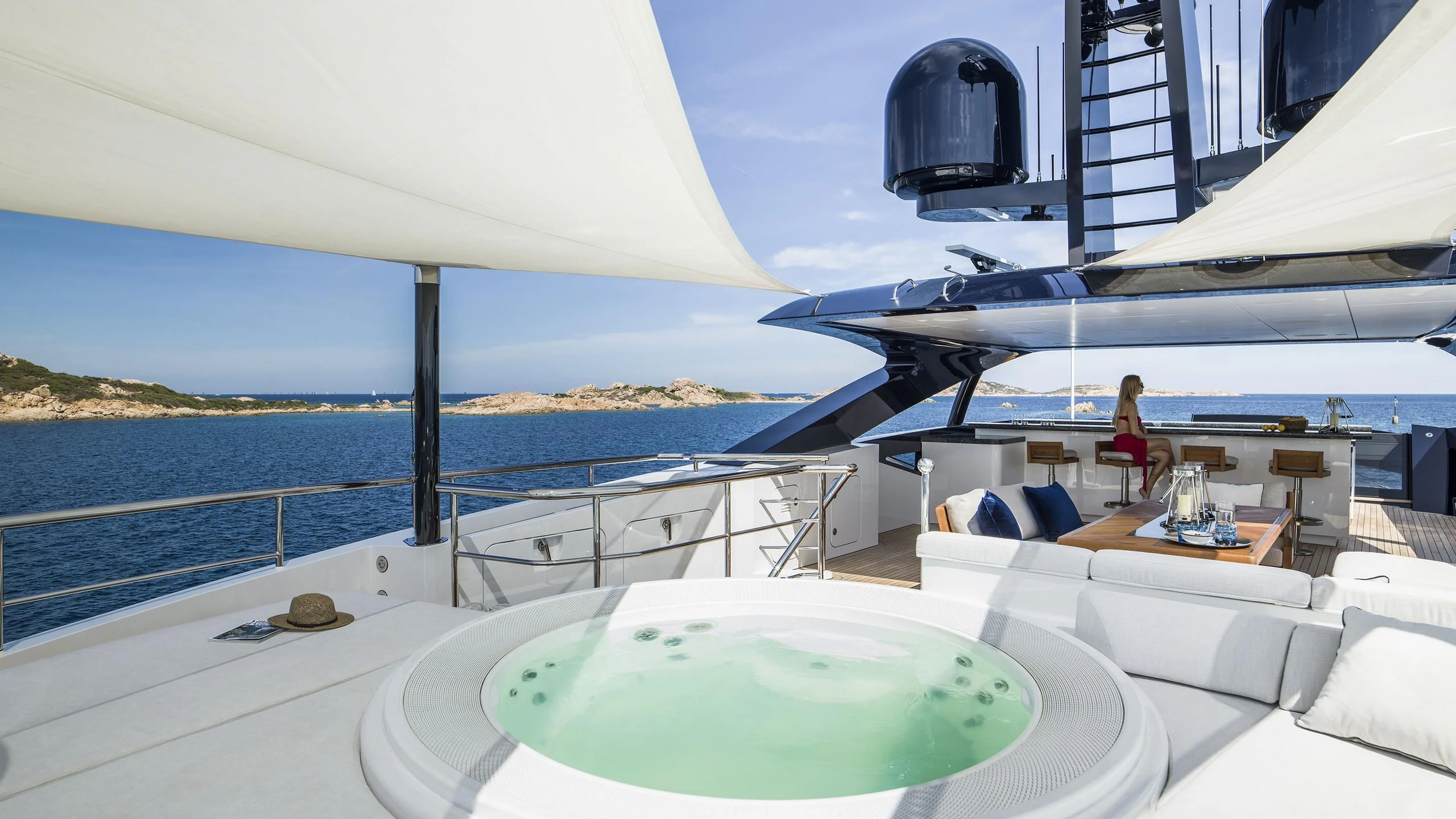 a person sitting on a yacht aboard IRISHA Yacht for Sale