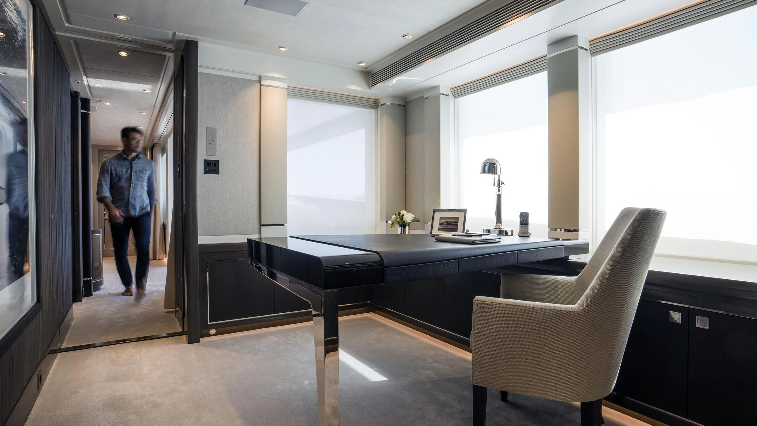 a person standing in a room aboard IRISHA Yacht for Sale