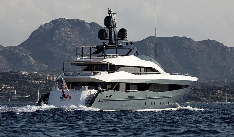 a large white boat in the water aboard IRISHA Yacht for Sale