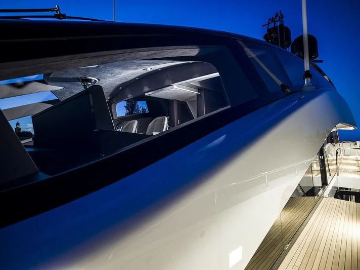 a car with the door open aboard IRISHA Yacht for Sale