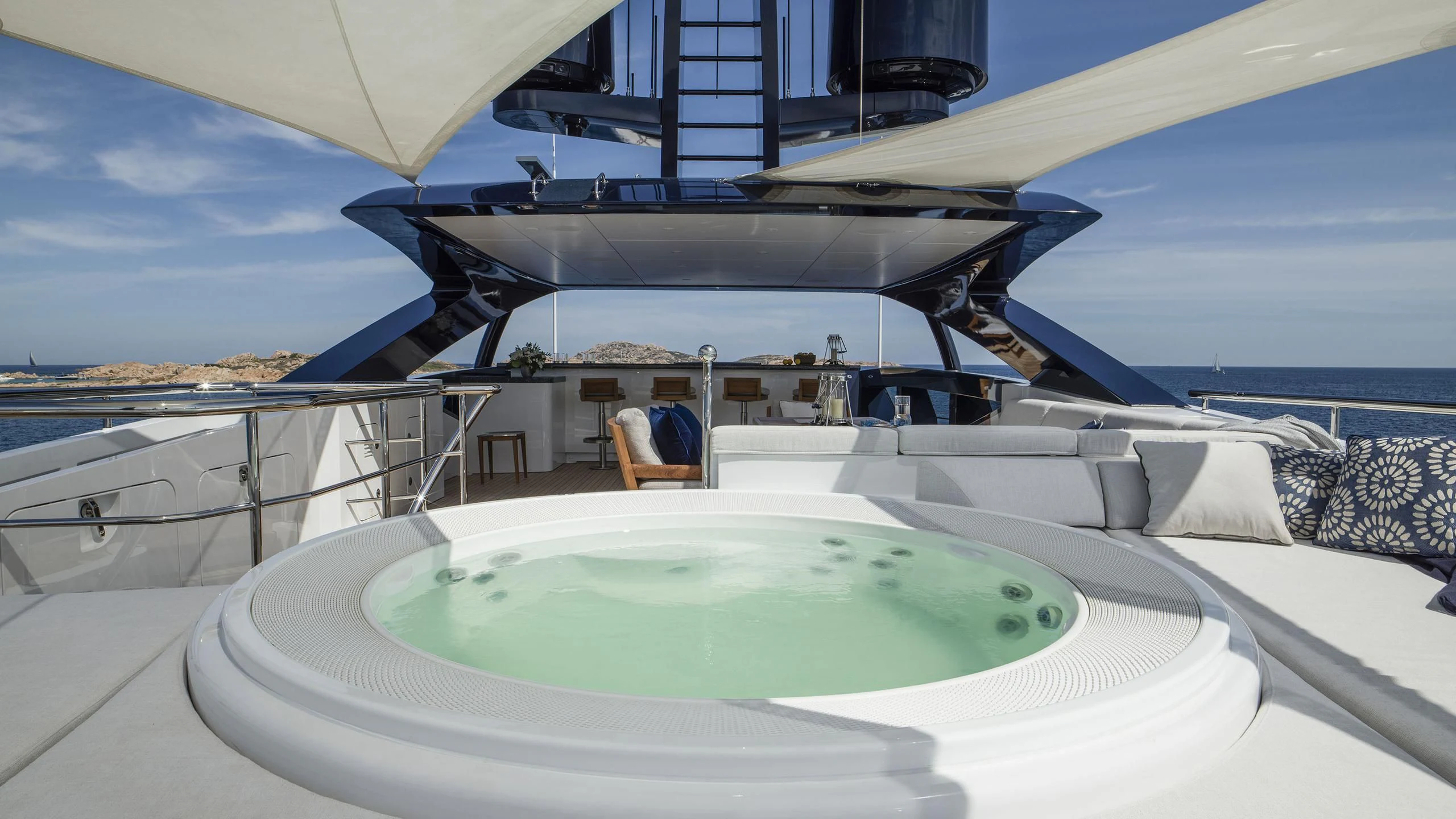 a large white swimming pool aboard IRISHA Yacht for Sale
