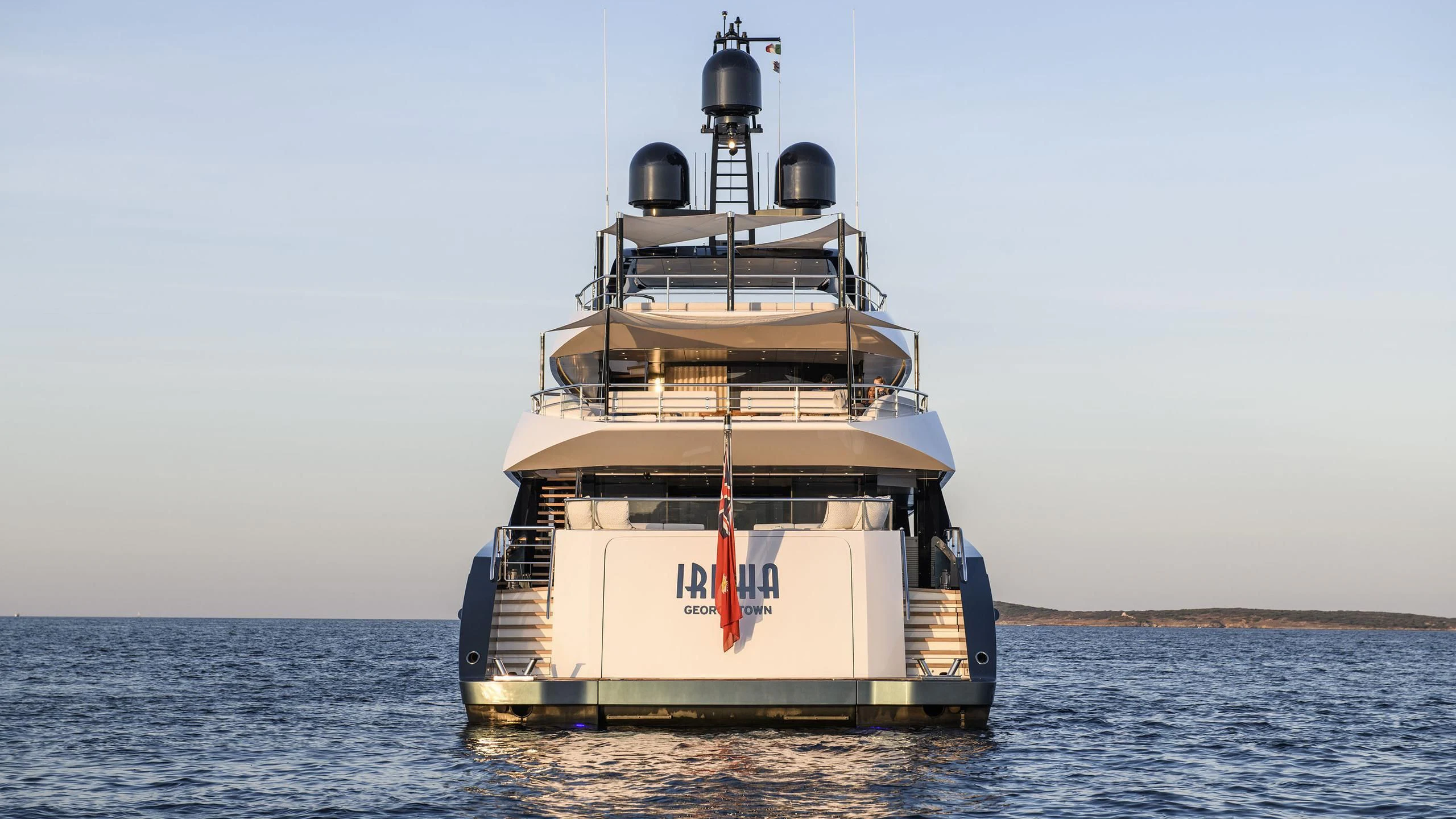 a large boat in the water aboard IRISHA Yacht for Sale