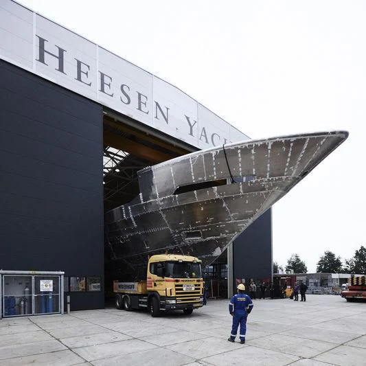 a bus parked outside a building aboard IRISHA Yacht for Sale