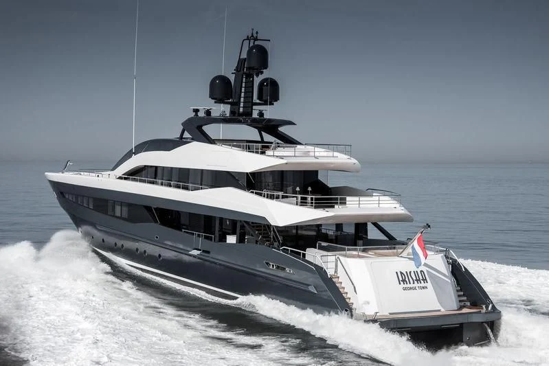 a large ship on the water aboard IRISHA Yacht for Sale