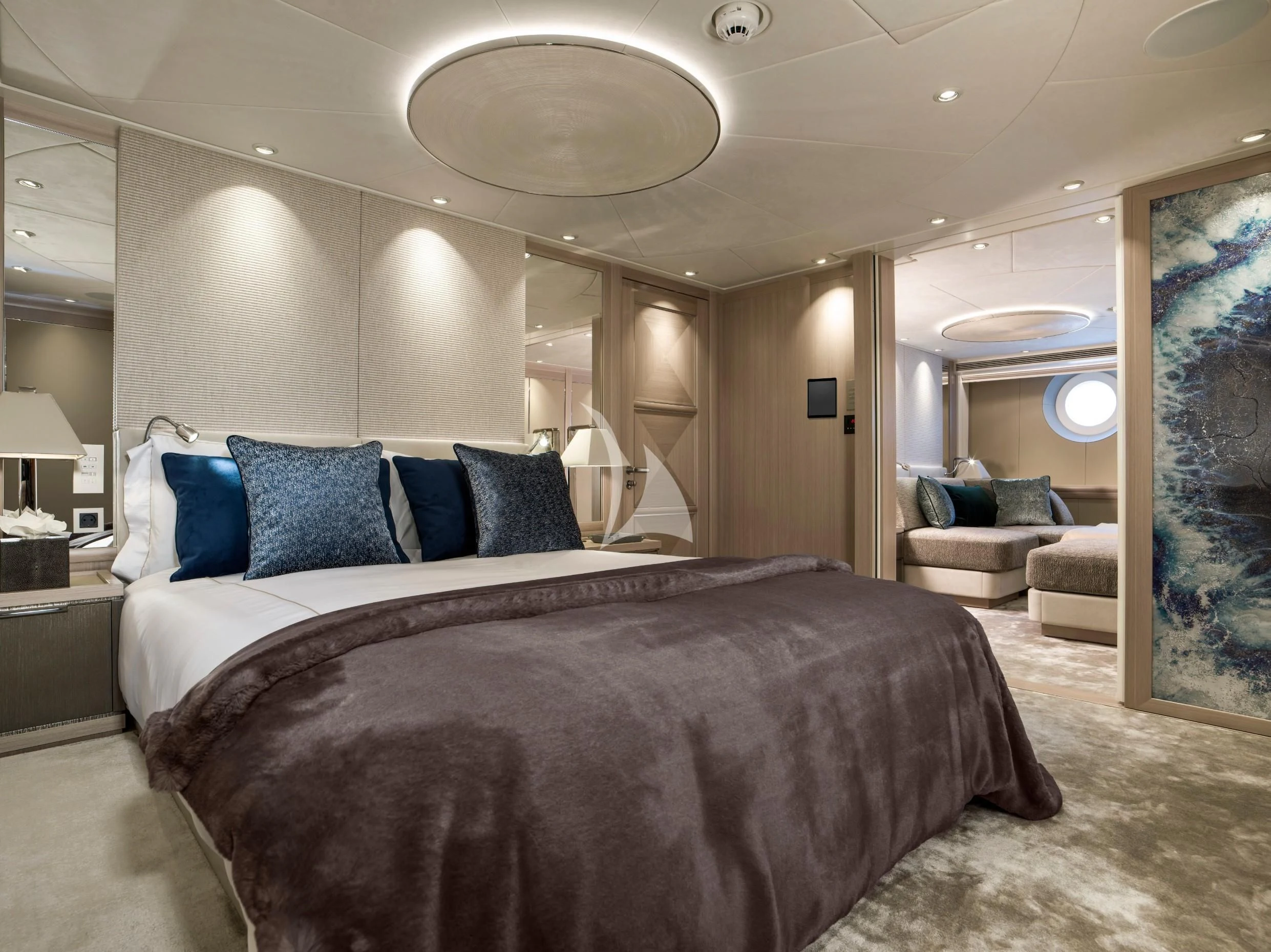 a large bed in a hotel room aboard IRISHA Yacht for Sale