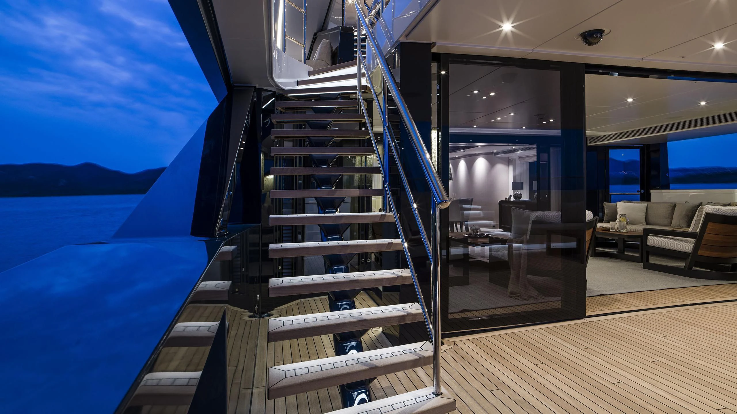 a staircase leading to a beach aboard IRISHA Yacht for Sale