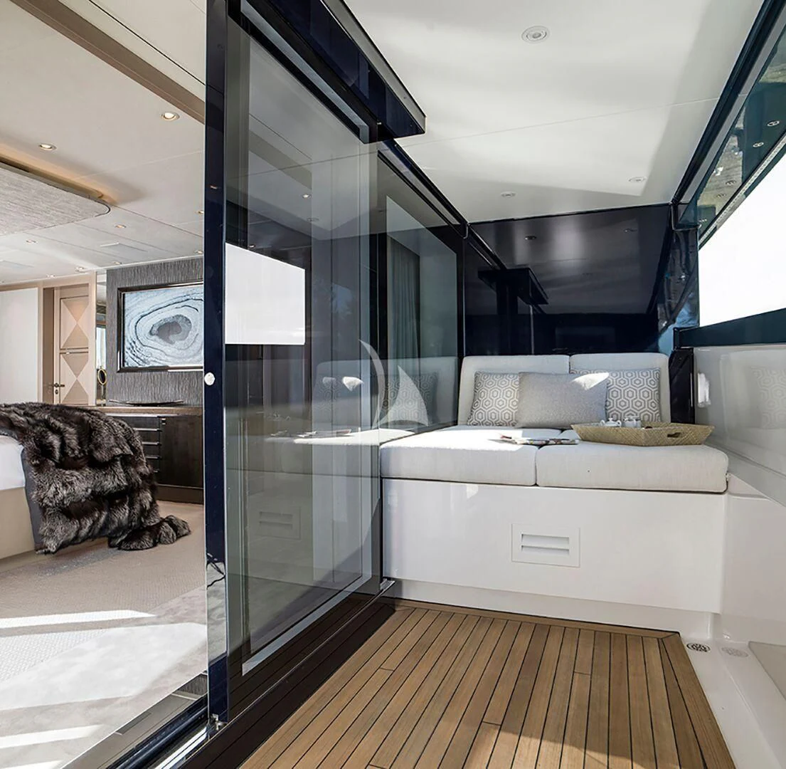 a room with a glass wall aboard IRISHA Yacht for Sale