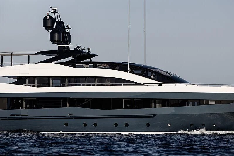 a large white boat in the water aboard IRISHA Yacht for Sale