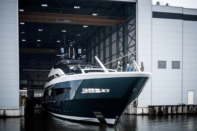 a boat in a large building aboard IRISHA Yacht for Sale