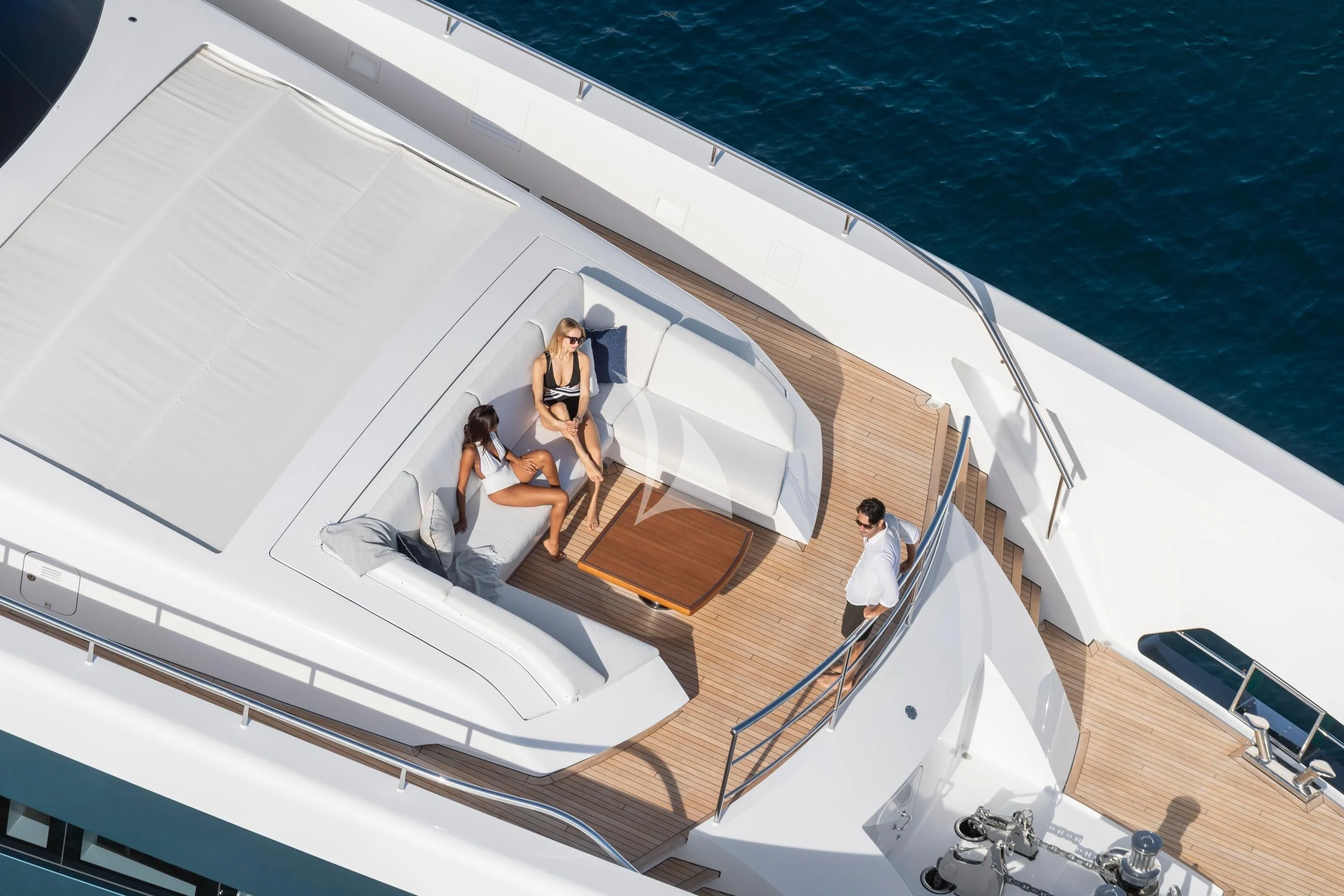 a group of people on a boat aboard IRISHA Yacht for Sale