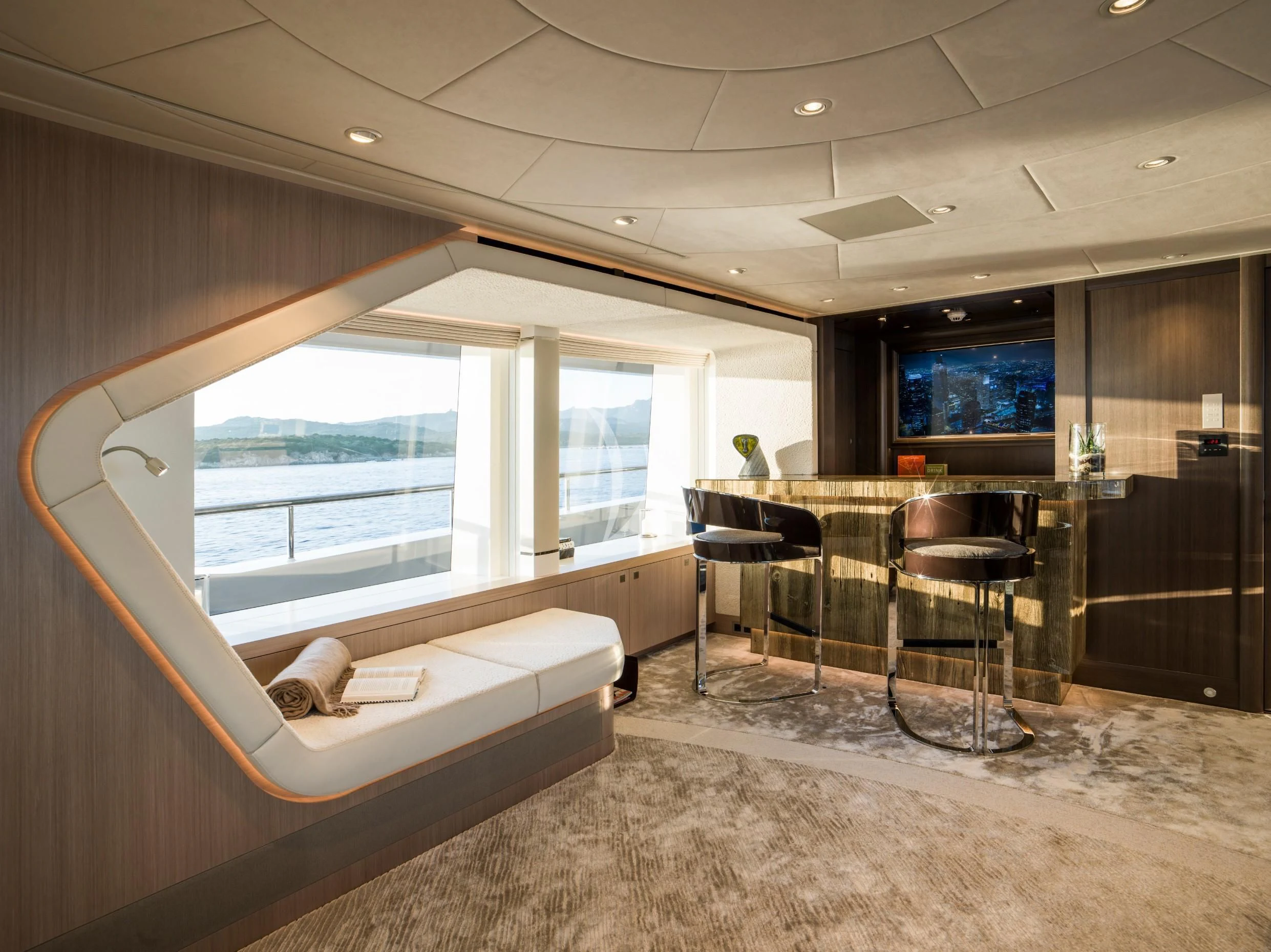a room with a bed and a table aboard IRISHA Yacht for Sale