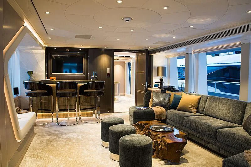 a living room with a couch and a tv aboard IRISHA Yacht for Sale