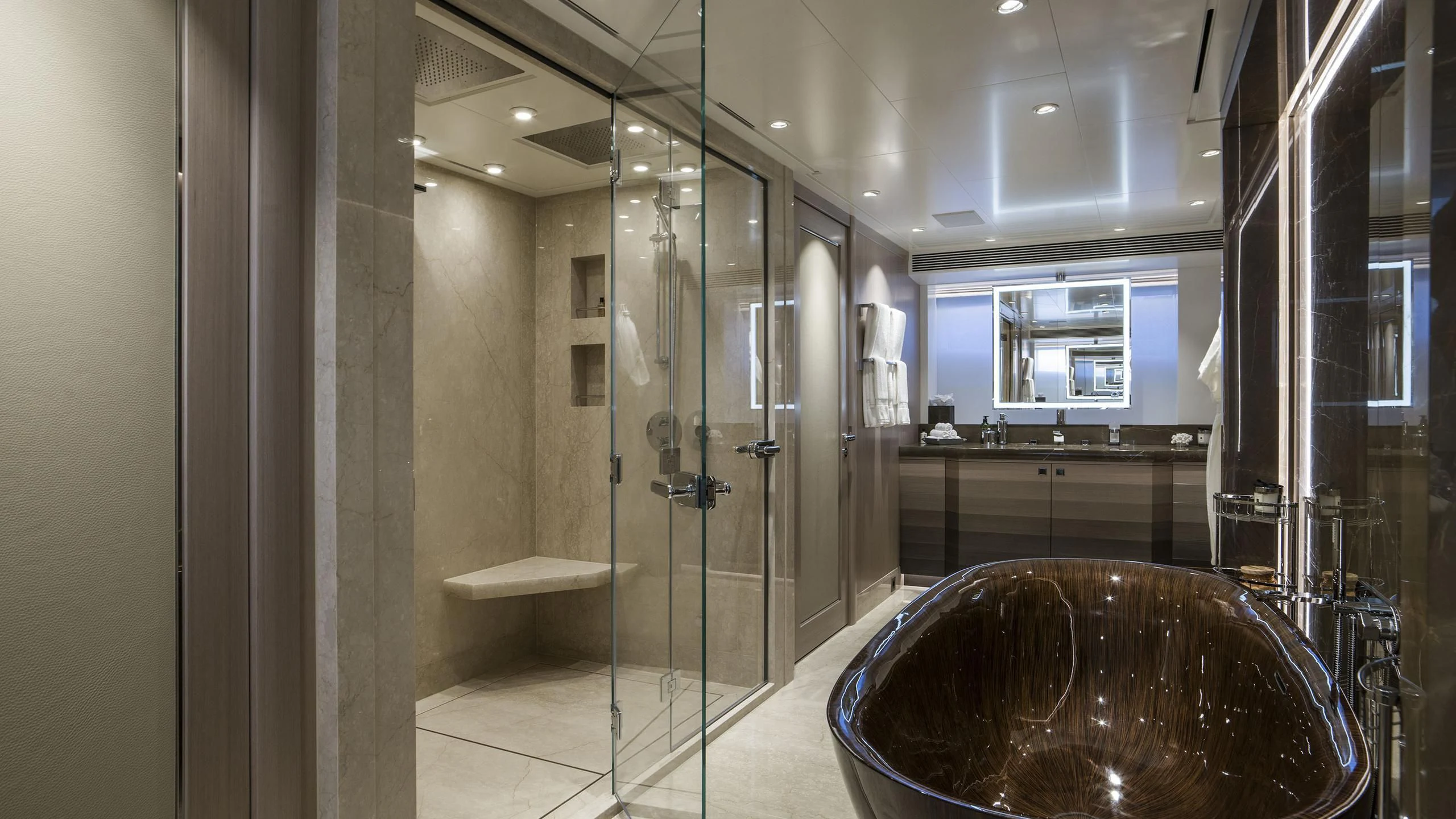 a bathroom with a large tub aboard IRISHA Yacht for Sale