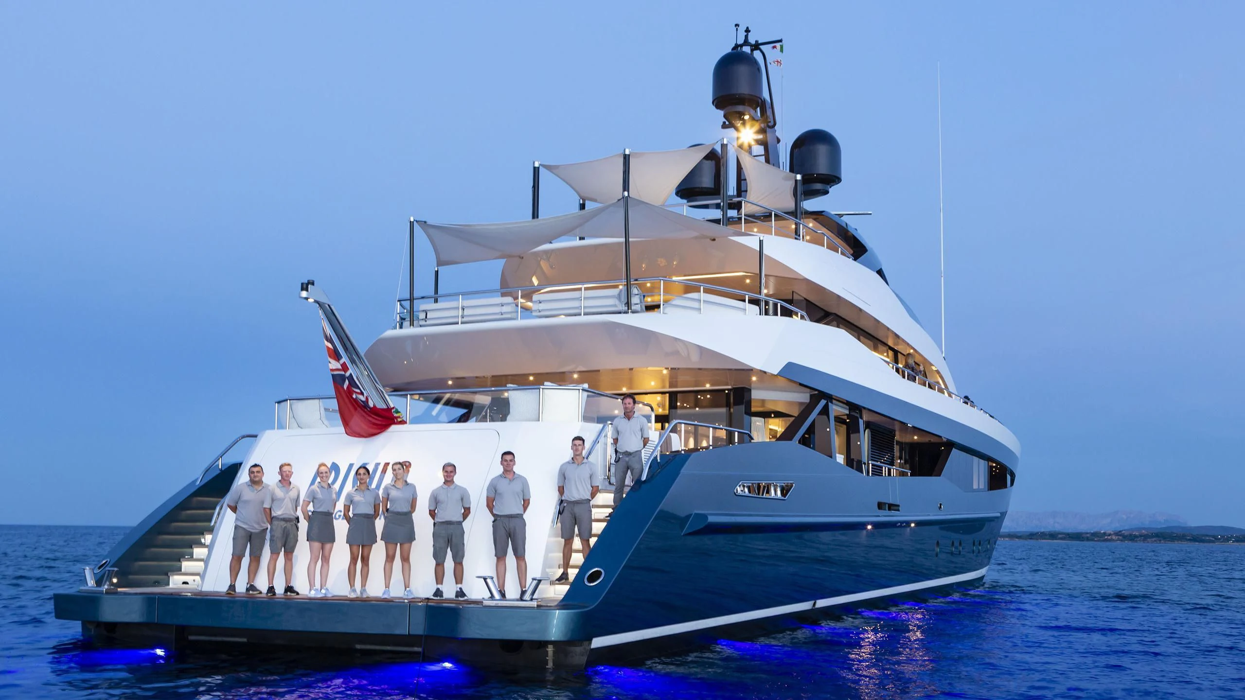 a group of people on a boat aboard IRISHA Yacht for Sale