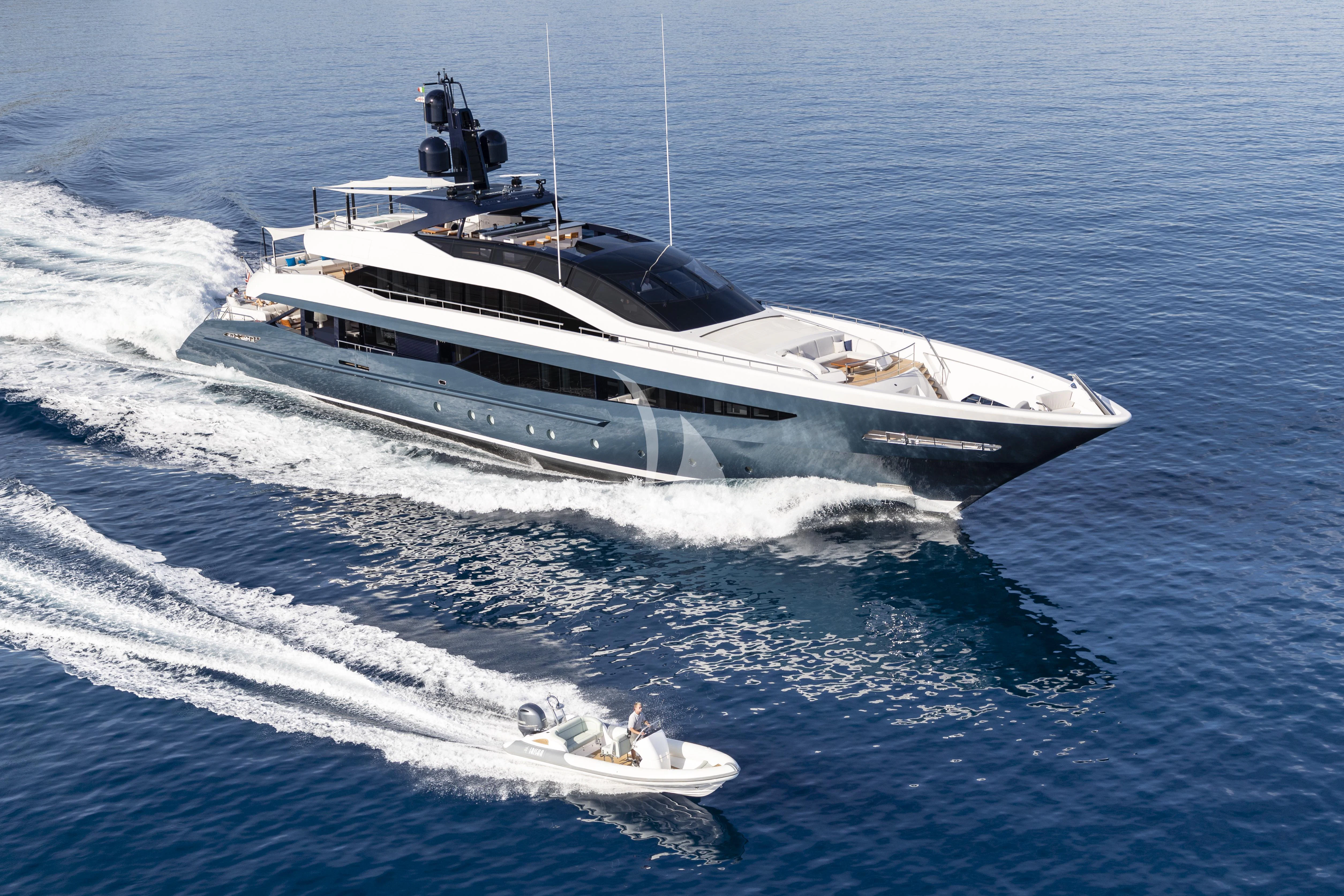 a white yacht on the water aboard IRISHA Yacht for Sale