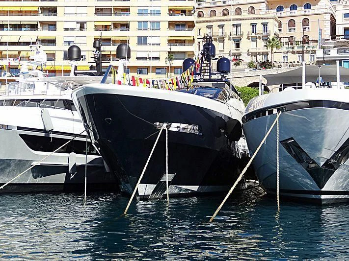 several boats are parked in the water aboard IRISHA Yacht for Sale