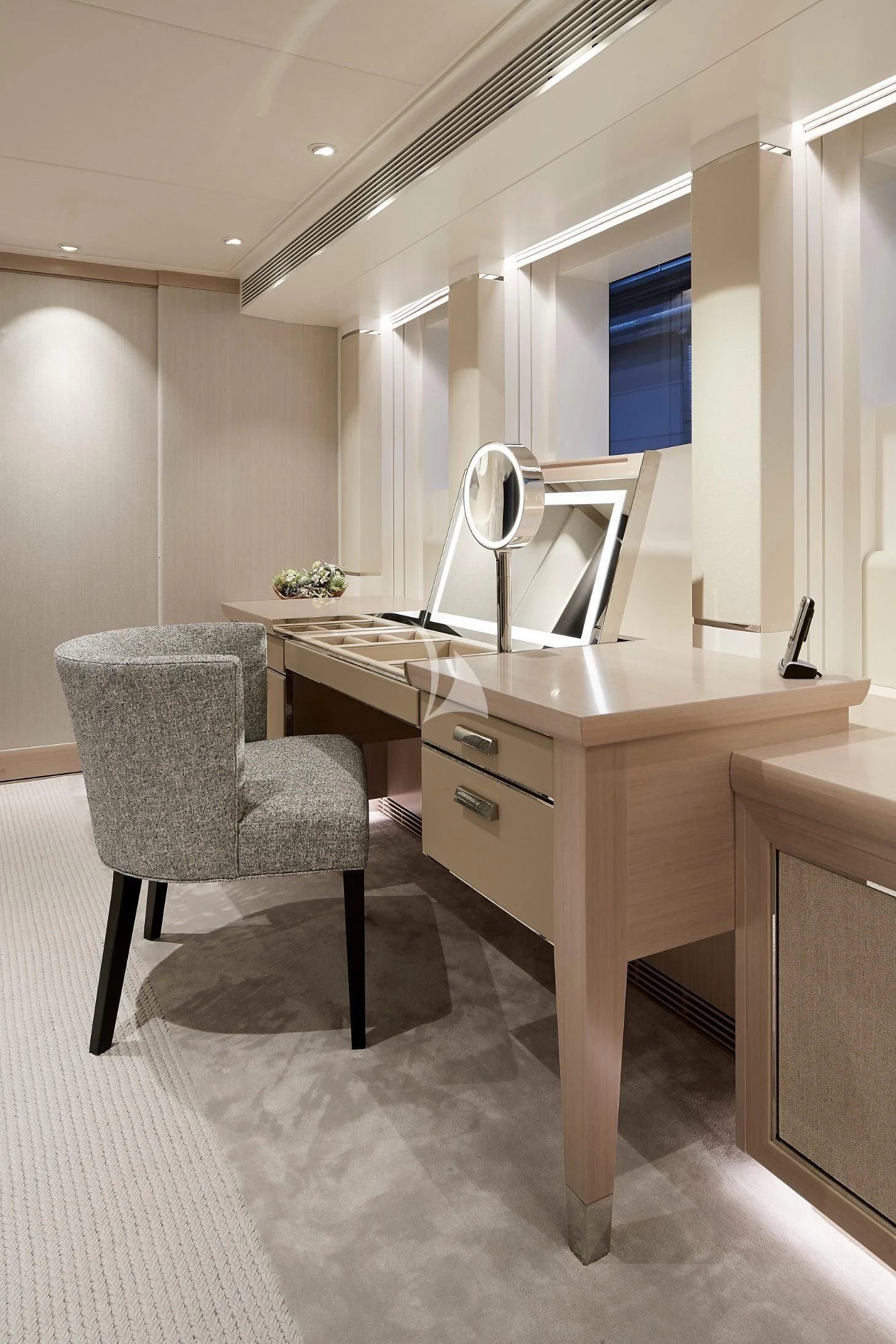 a room with a desk and a fan aboard IRISHA Yacht for Sale