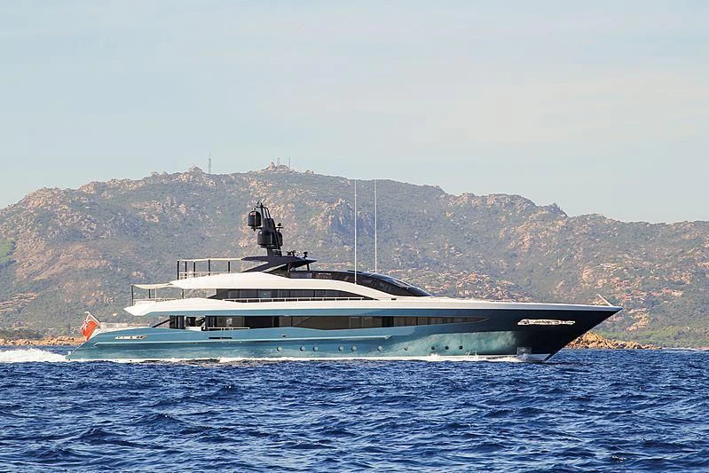 a large ship in the water aboard IRISHA Yacht for Sale