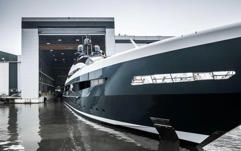 a large ship docked aboard IRISHA Yacht for Sale